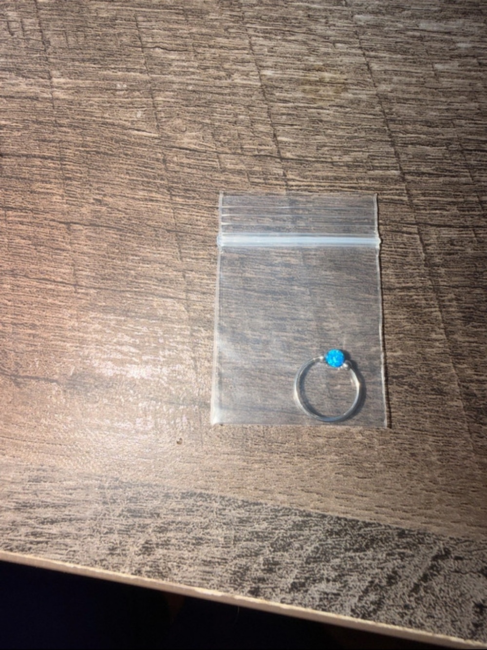 Clear Stainless Steel Ring with Blue Gem